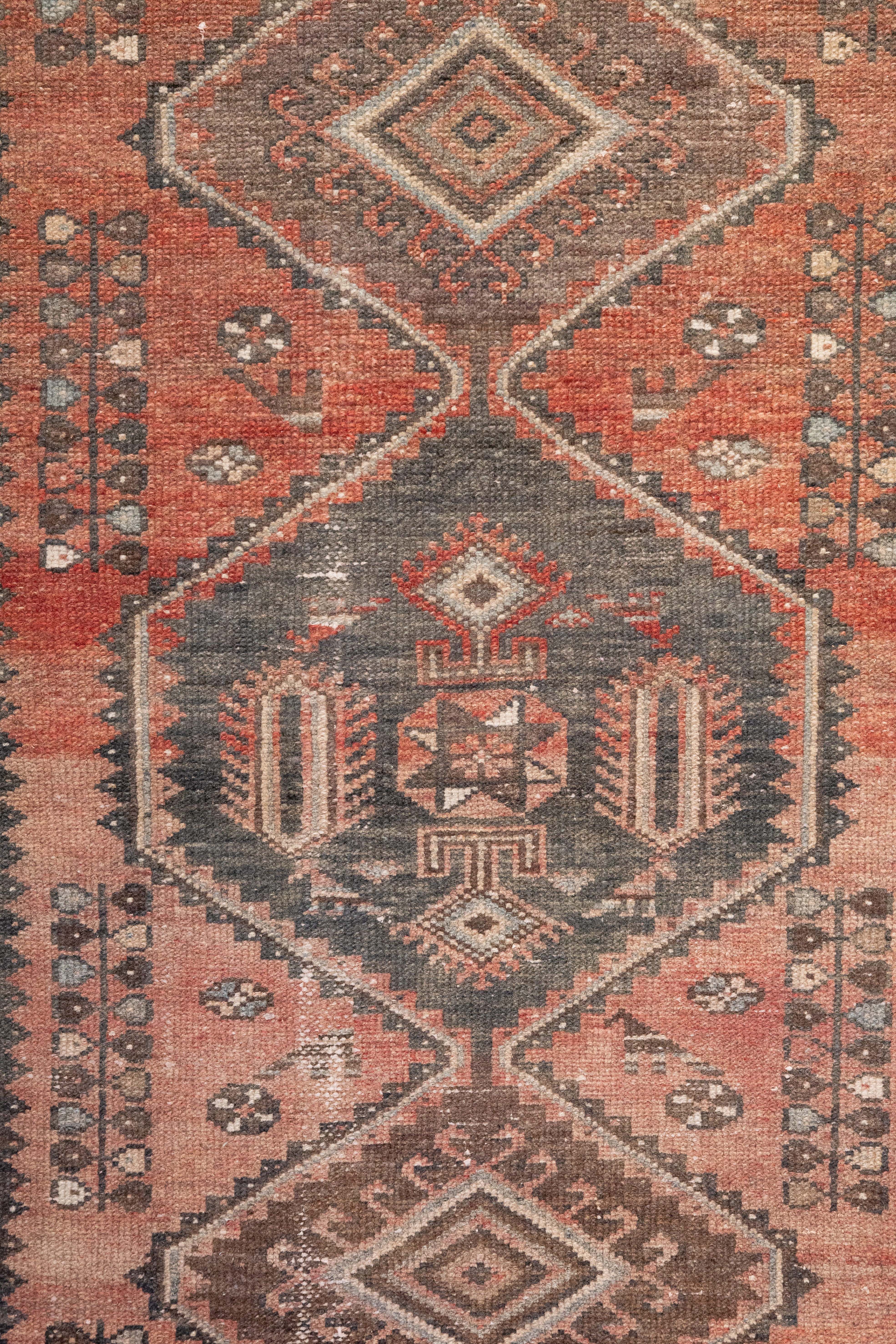 Close-up of a patterned rug with geometric design